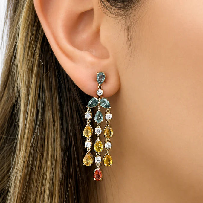 18k gold chandelier earrings with pear sapphire tiers and round diamond accents