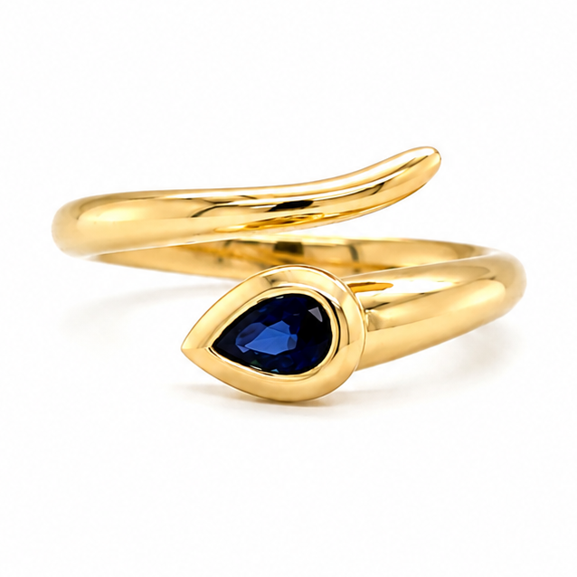 adjustable 14k gold ring with pear shape blue sapphire, close up