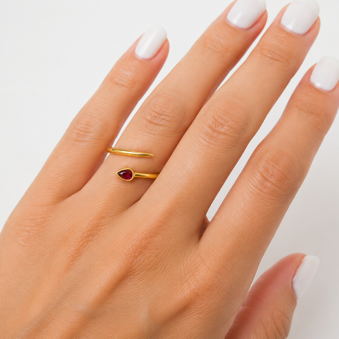 pear shape ruby ring in 14k yellow gold, detail view