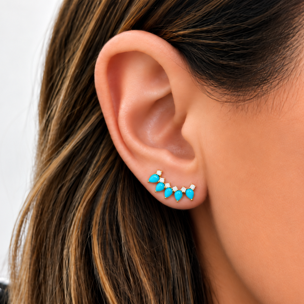 Turquoise and diamond crawler earring in 14k yellow gold, worn on the ear