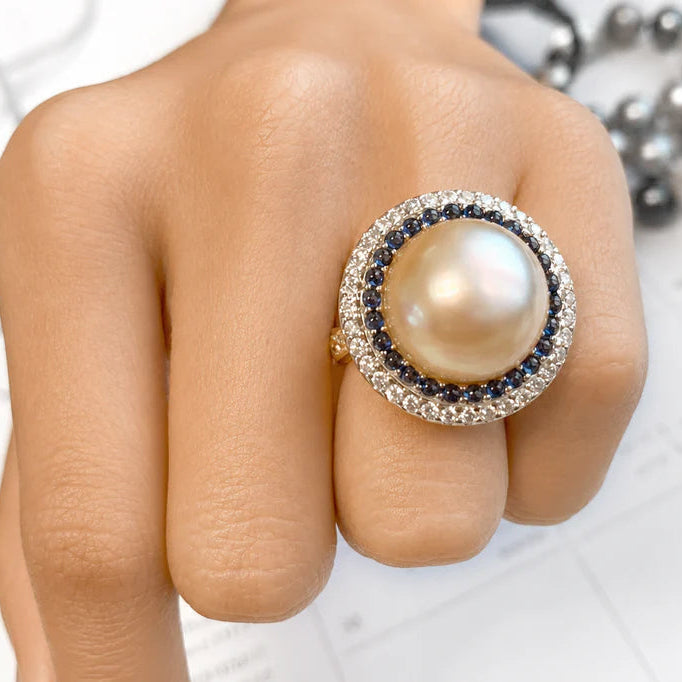 Pearl, sapphire, and diamond ring in 18k rose gold