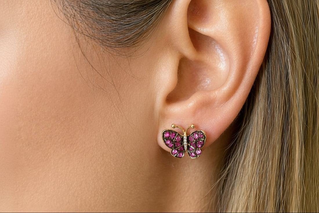18k yellow gold butterfly stud earrings with pink sapphires and diamond accents