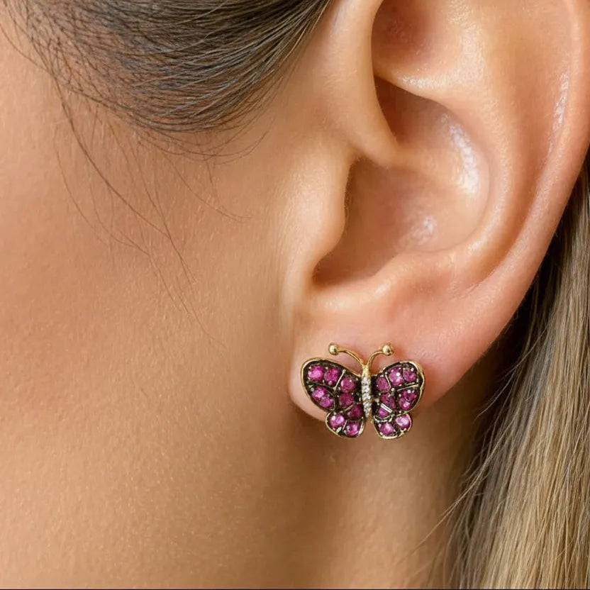18k yellow gold butterfly stud earrings with pink sapphires and diamond accents