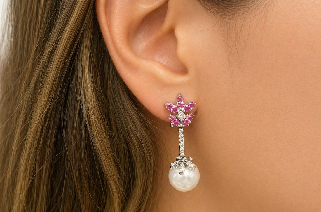 18k white gold earrings with pink sapphires, diamonds, and South Sea pearls by Diamond Tales
