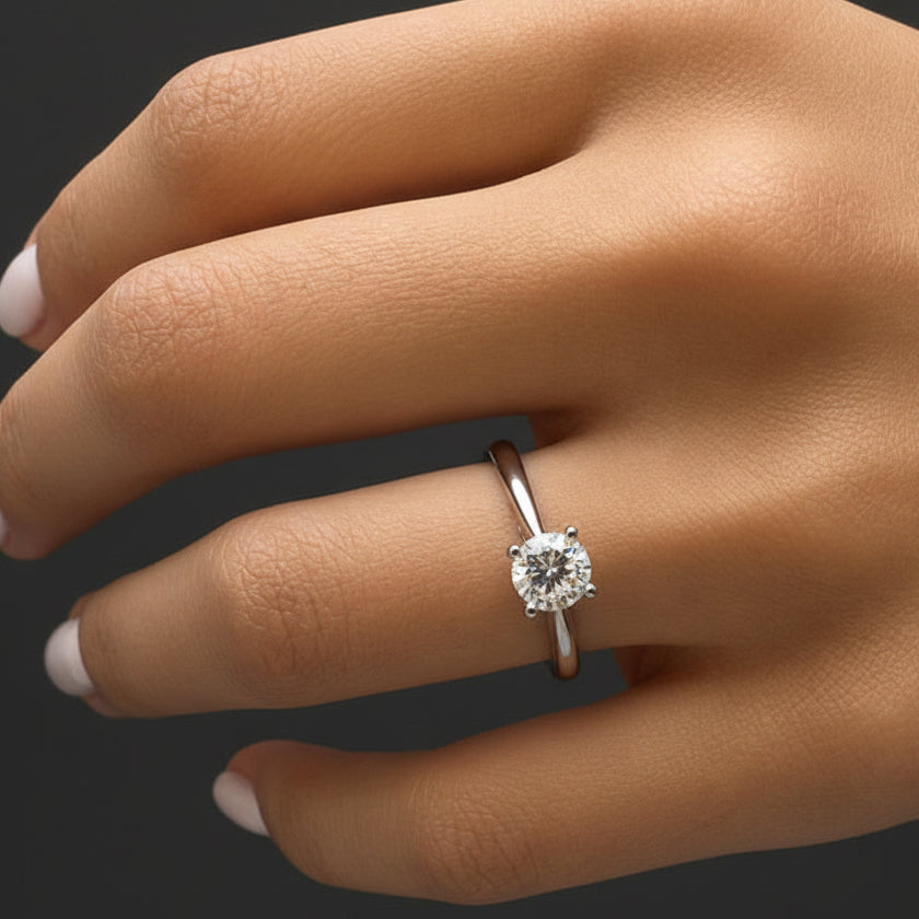 platinum solitaire ring with GIA-certified round brilliant diamond, 1.23 cts