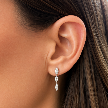 close up of platinum marquise diamond inline drop earrings brilliance detail