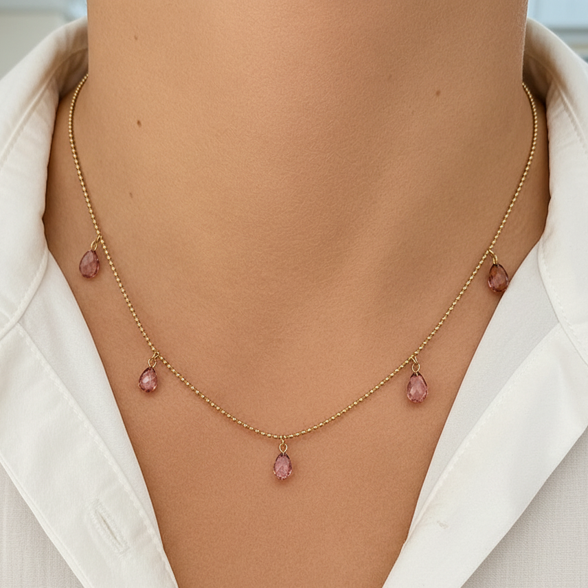 14k gold shaker necklace with five purple sapphires