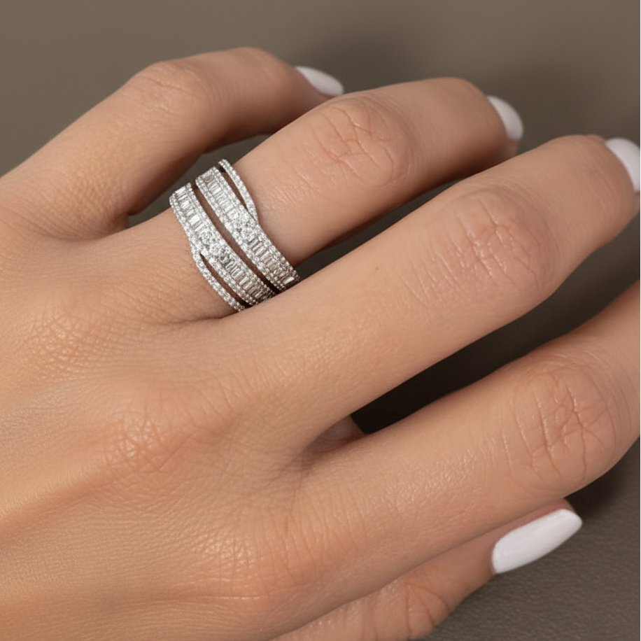 18k white gold double-band ring with approximately 0.80 ct round and baguette-cut diamonds