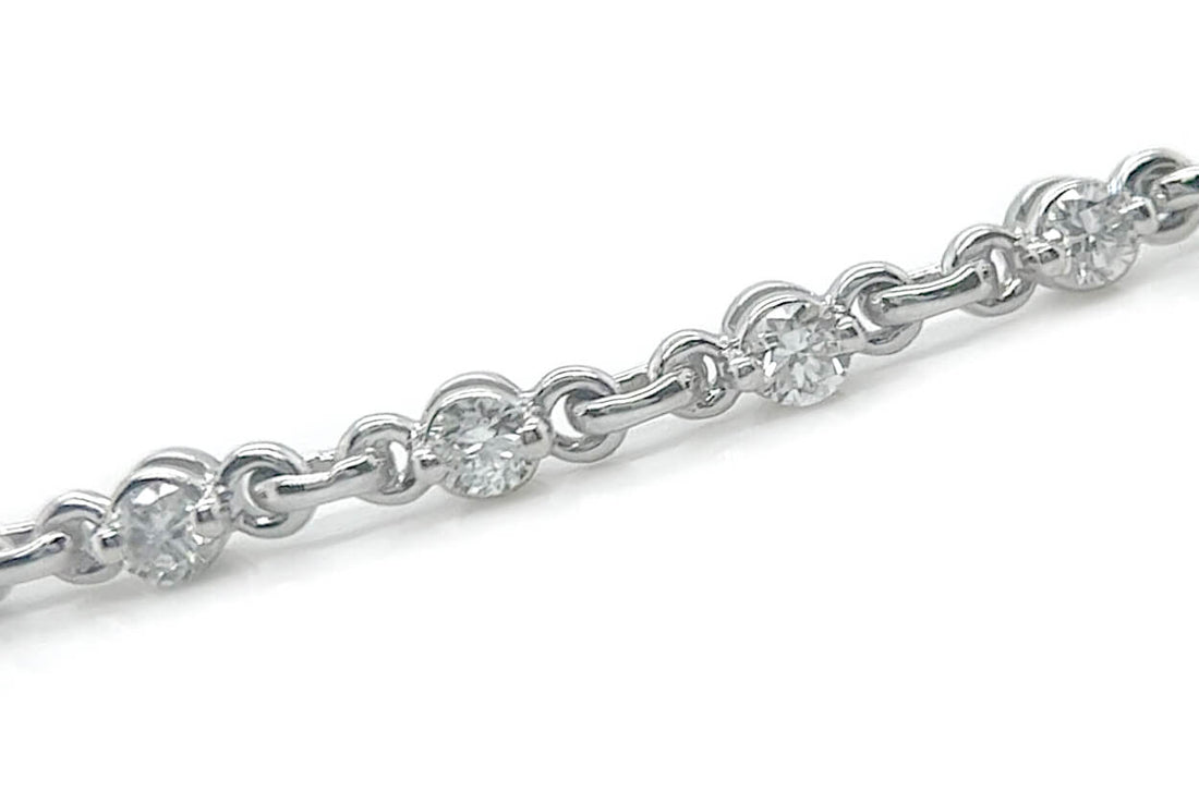14k gold chain bracelet with round brilliant diamonds by Diamond Tales