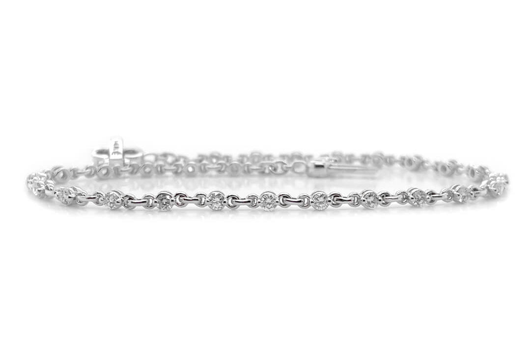 14k gold chain bracelet with round brilliant diamonds by Diamond Tales