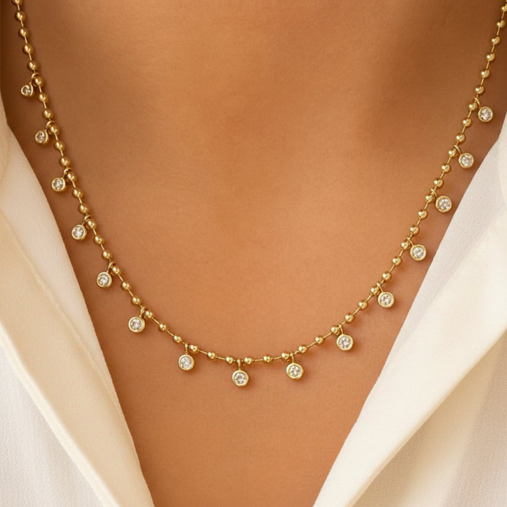 round diamond drop necklace in 14k gold with vertical diamond arrangement