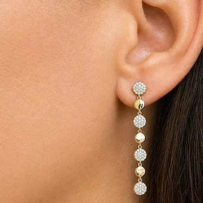 round diamond inline drop earrings in 14k gold with vertical diamond arrangement