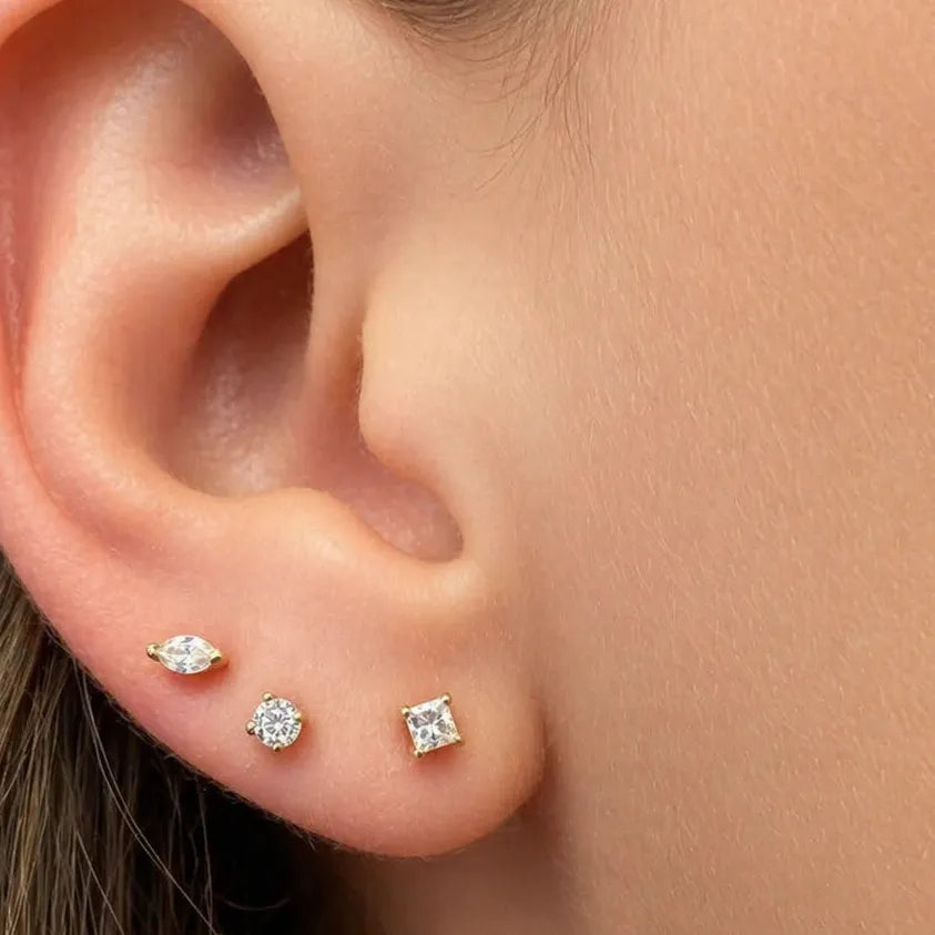 14k gold mini stud earrings with round diamonds