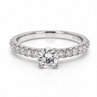 18k gold ring with round diamond and pavé diamonds