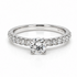 18k gold ring with round diamond and pavé diamonds