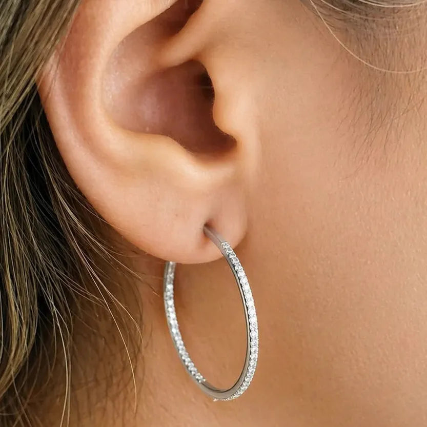 14k white gold hoop earrings, 27 mm diameter, with front-facing diamond pave