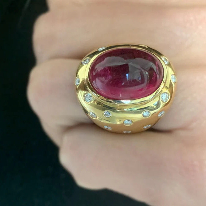 18k yellow gold ring with rubellite cabochon and diamond accents