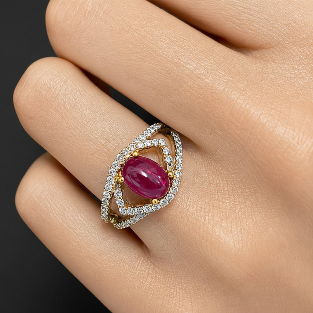 18k white gold ring with ruby cabochon and diamond accents