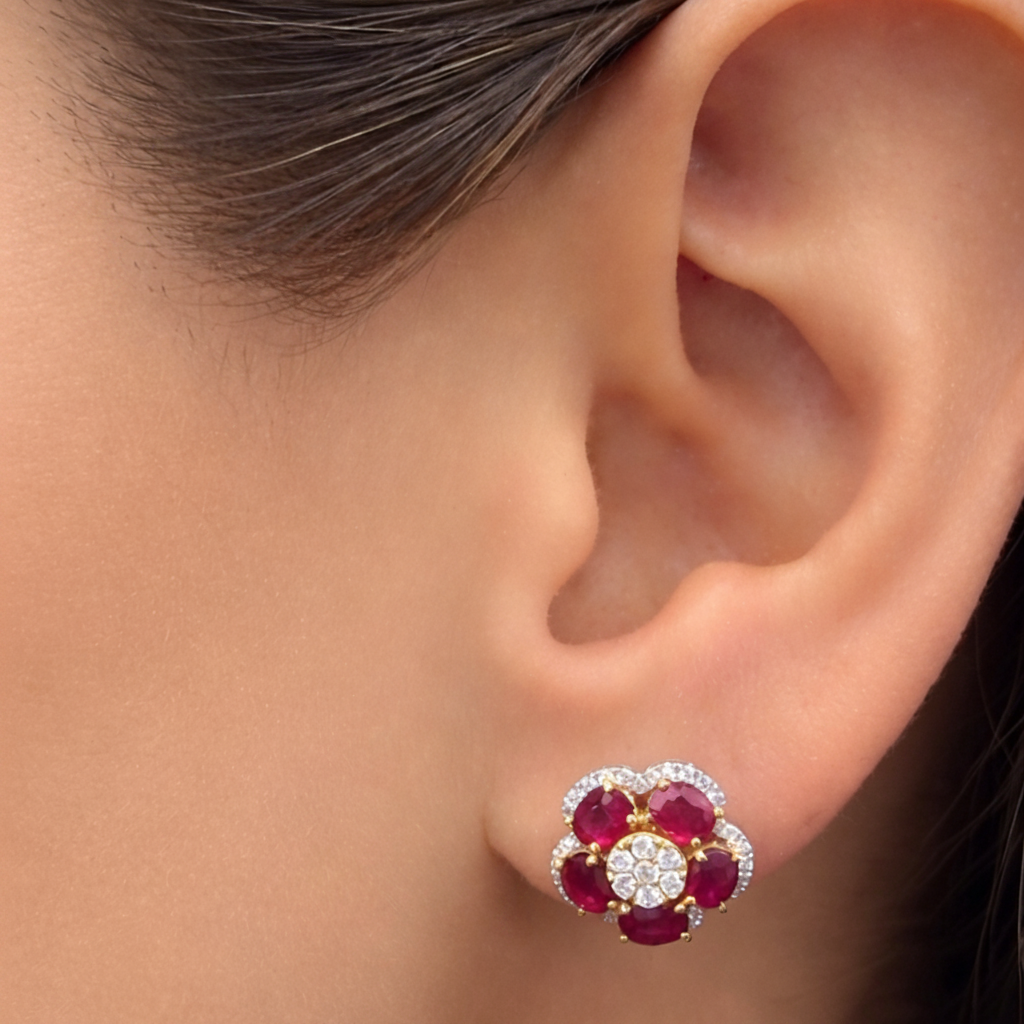 18k yellow and white gold ruby and diamond flower earrings by Diamond Tales
