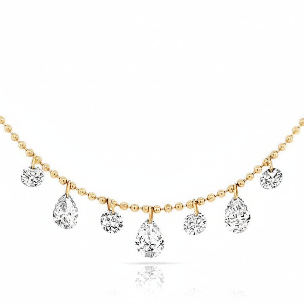 seven stone pear and round lab diamond necklace in 18k gold