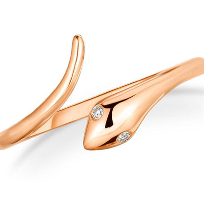 14k rose gold ring shaped as a coiled snake with diamond-set eyes
