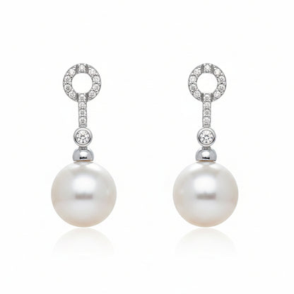 18k white gold dangle earrings with South Sea pearl drops and diamond accents