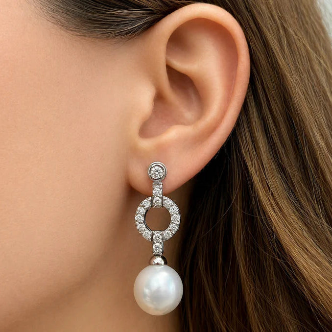 18k white gold drop earrings with large South Sea pearls and diamond accents