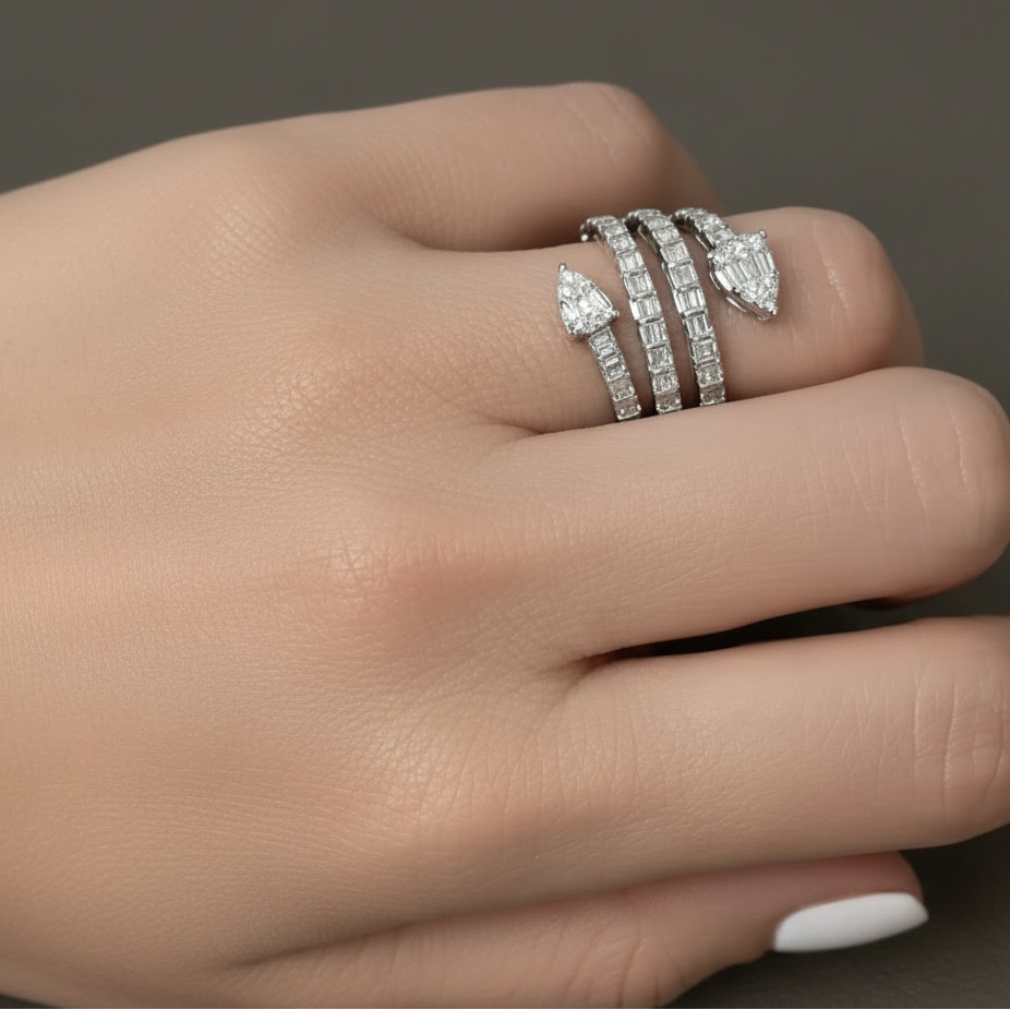 18k white gold spiral ring with approximately 0.86 ct mixed-cut diamonds