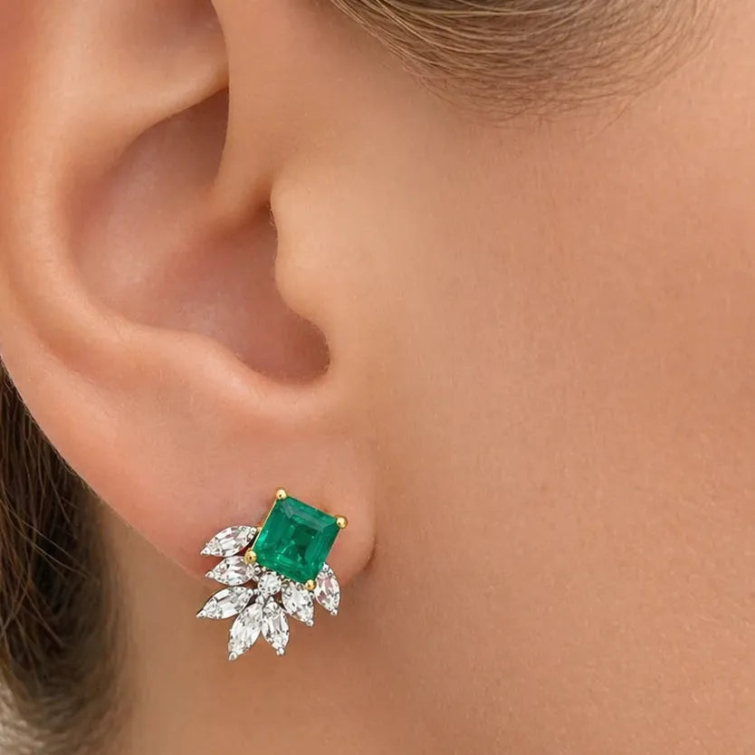Two-tone 18k gold stud earrings with square emerald and marquise illusion diamonds