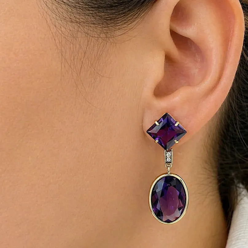 14k yellow gold stud earrings featuring square and oval amethysts with diamond accents