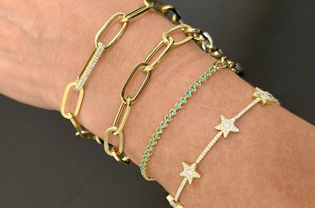 14k gold bracelet with star motifs and round brilliant diamonds by Diamond Tales