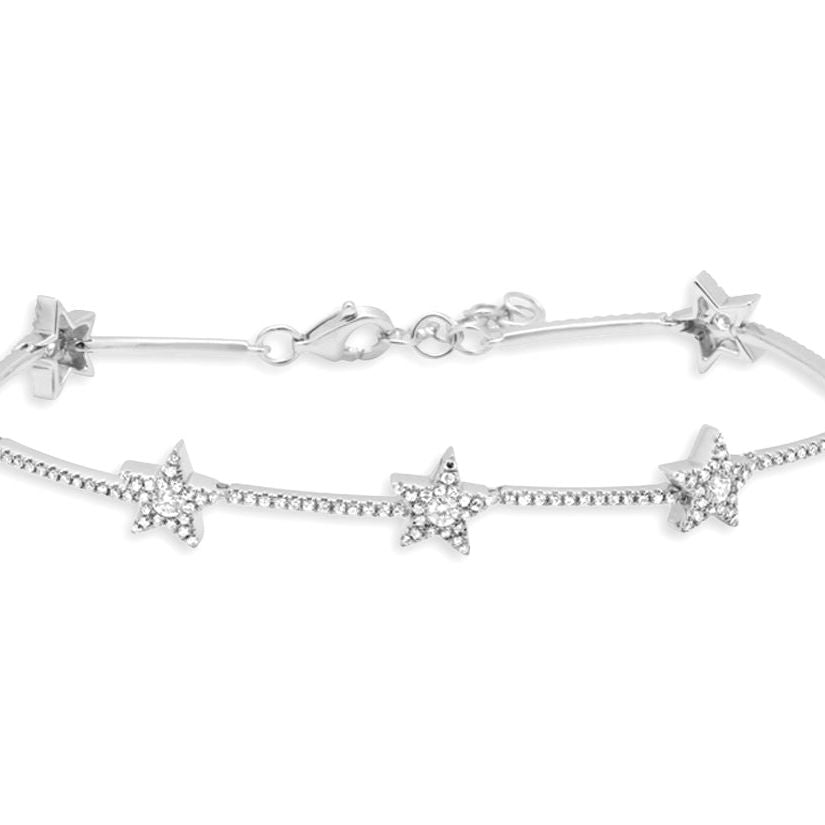 14k gold bracelet with star motifs and round brilliant diamonds by Diamond Tales
