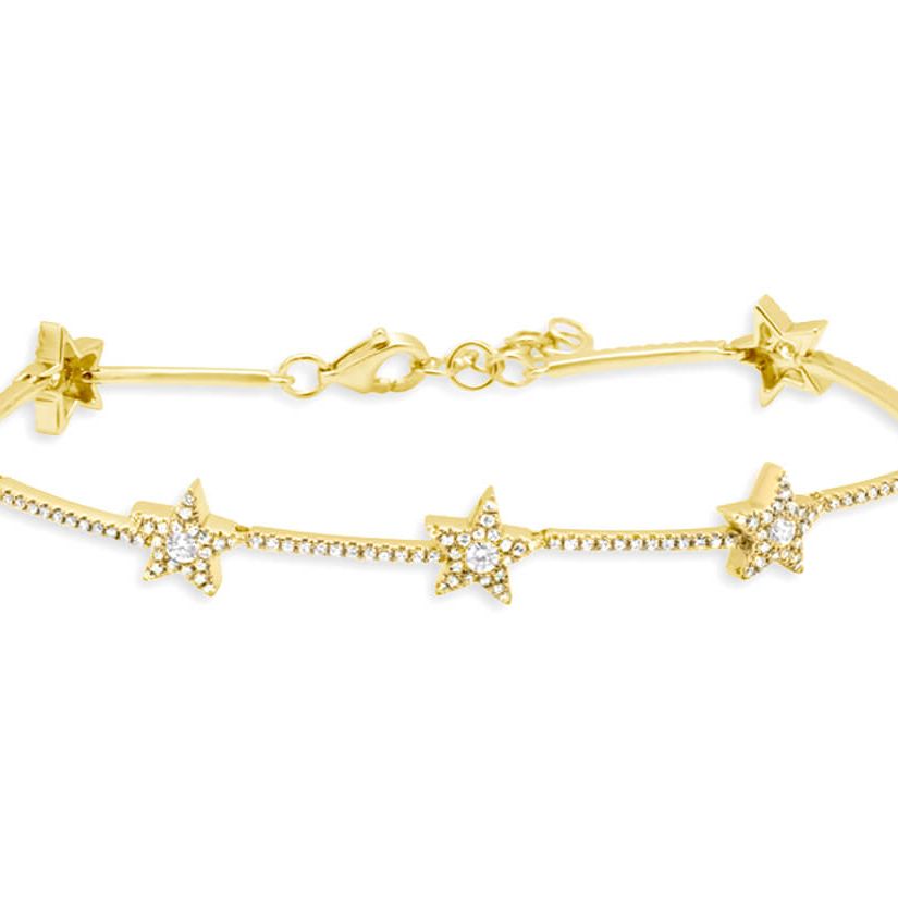 14k gold bracelet with star motifs and round brilliant diamonds by Diamond Tales