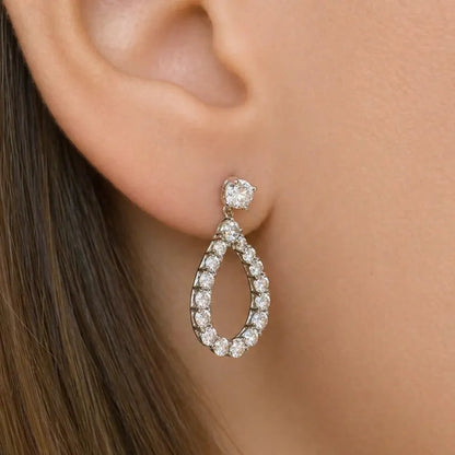 18k gold teardrop earrings with diamond accents