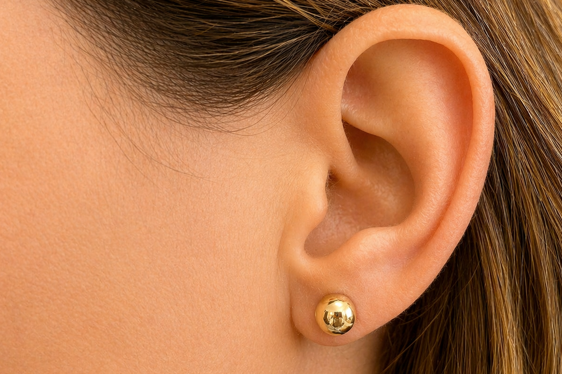 14k gold tennis ball earrings by Diamond Tales