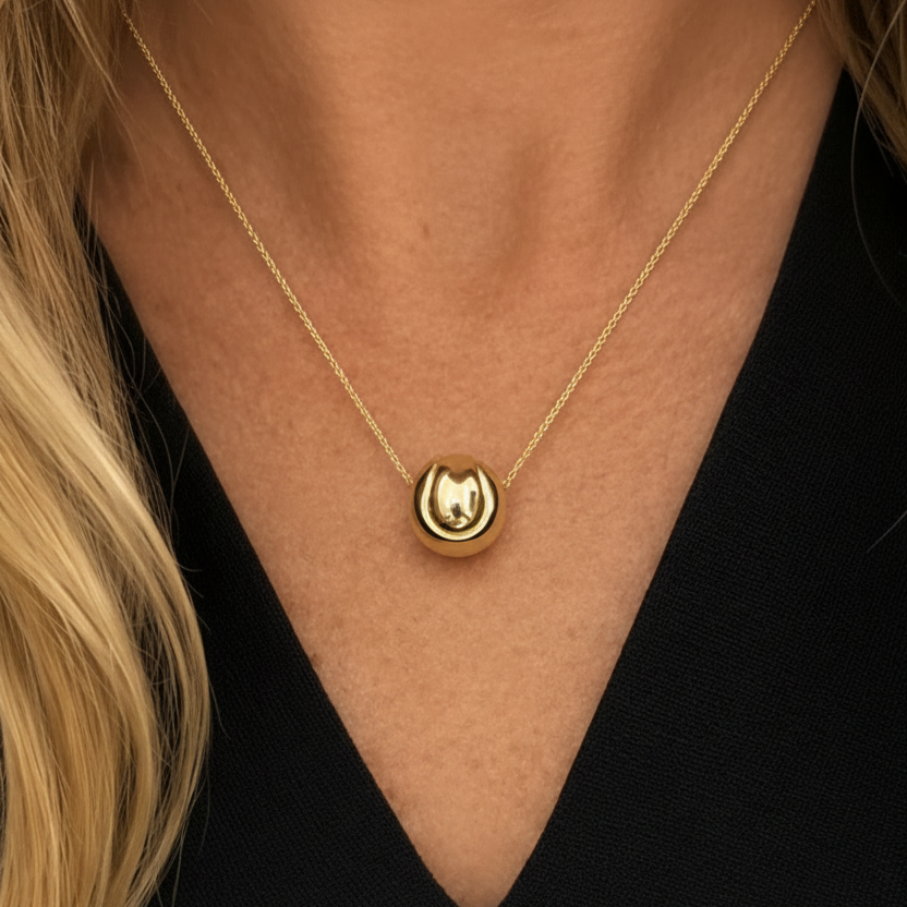 14k gold tennis ball necklace by Diamond Tales