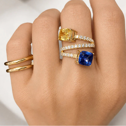18k yellow gold Toi et Moi ring with tanzanite, sapphire, and diamond accents