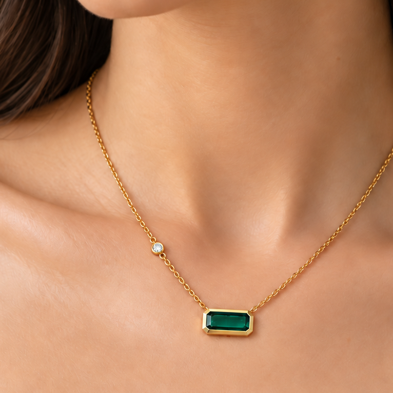 Emerald-cut tourmaline pendant in 14k yellow gold, detail view
