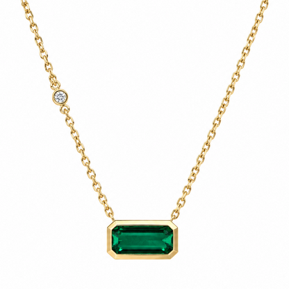 Emerald-cut tourmaline and diamond pendant necklace in 14k yellow gold