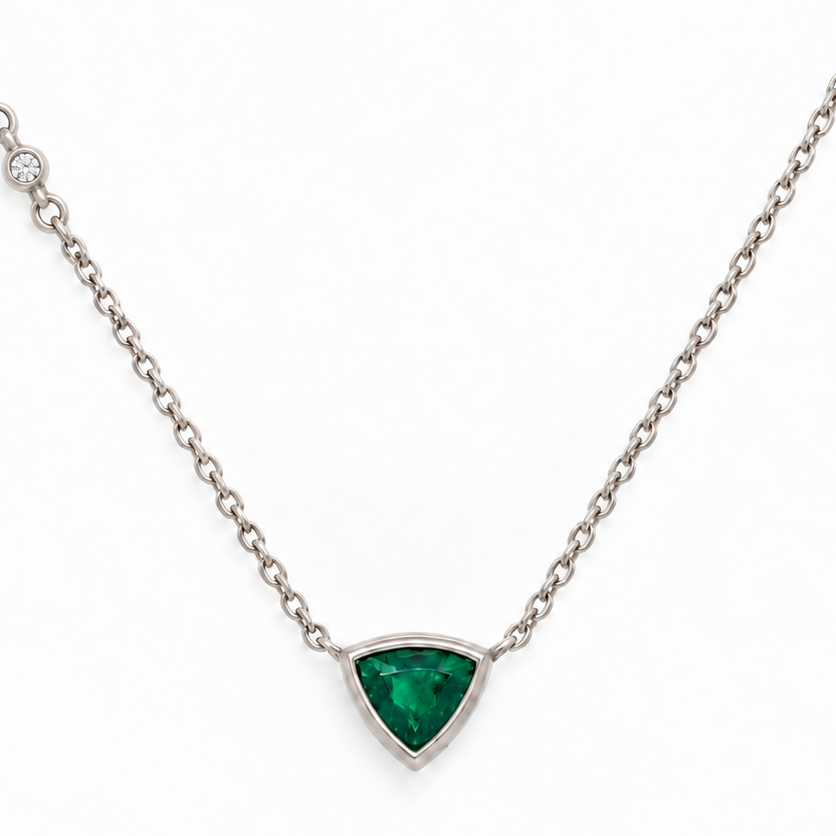 Trillion-cut emerald and diamond pendant necklace in 14k white gold