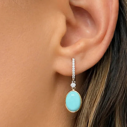 18k two-tone gold hoop earrings with turquoise ovals and 0.16 cts of diamonds