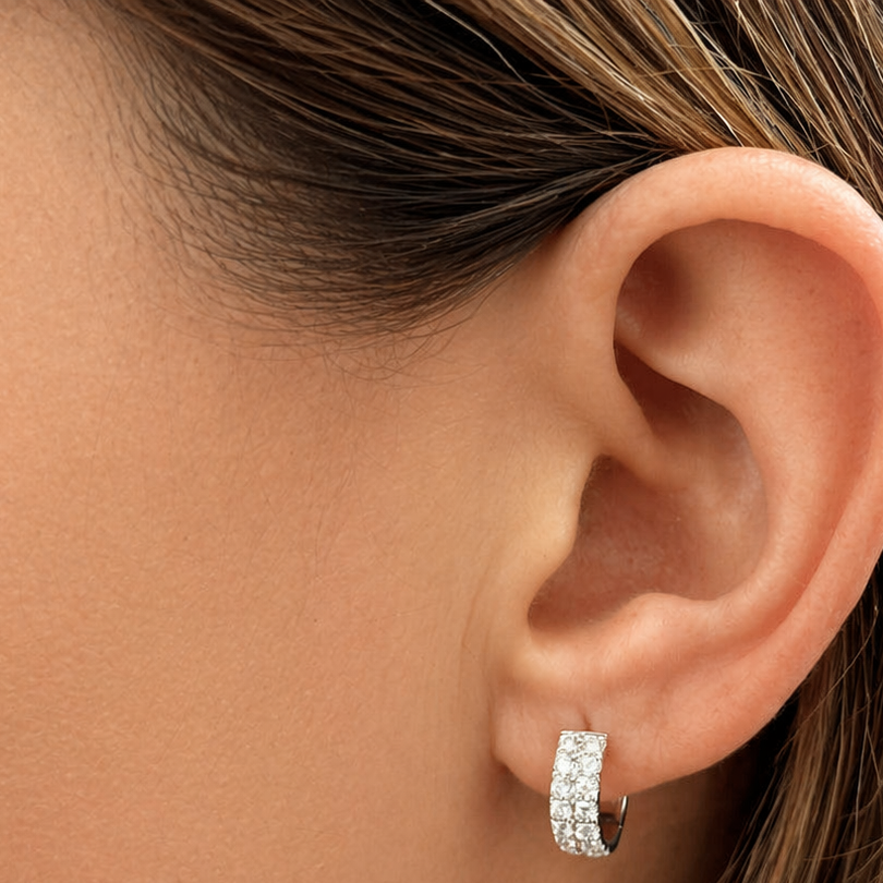 18k gold two row diamond huggie earrings by Diamond Tales