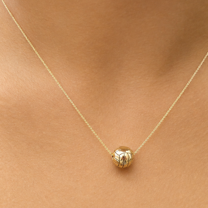 14k gold volleyball necklace by Diamond Tales