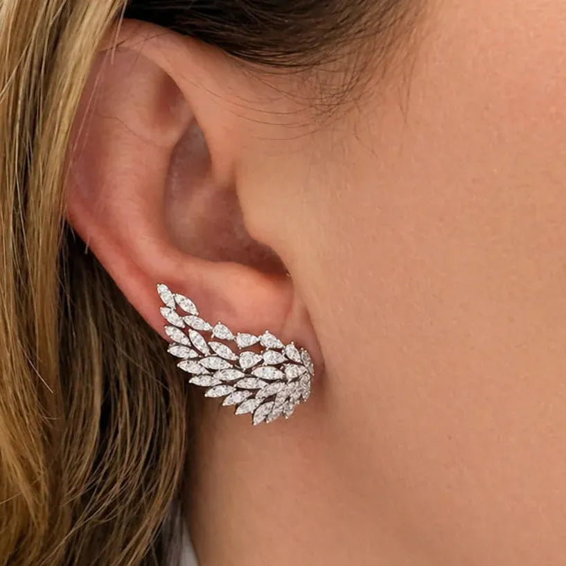 Wing-shaped diamond earrings in 18k white gold – Diamond Tales