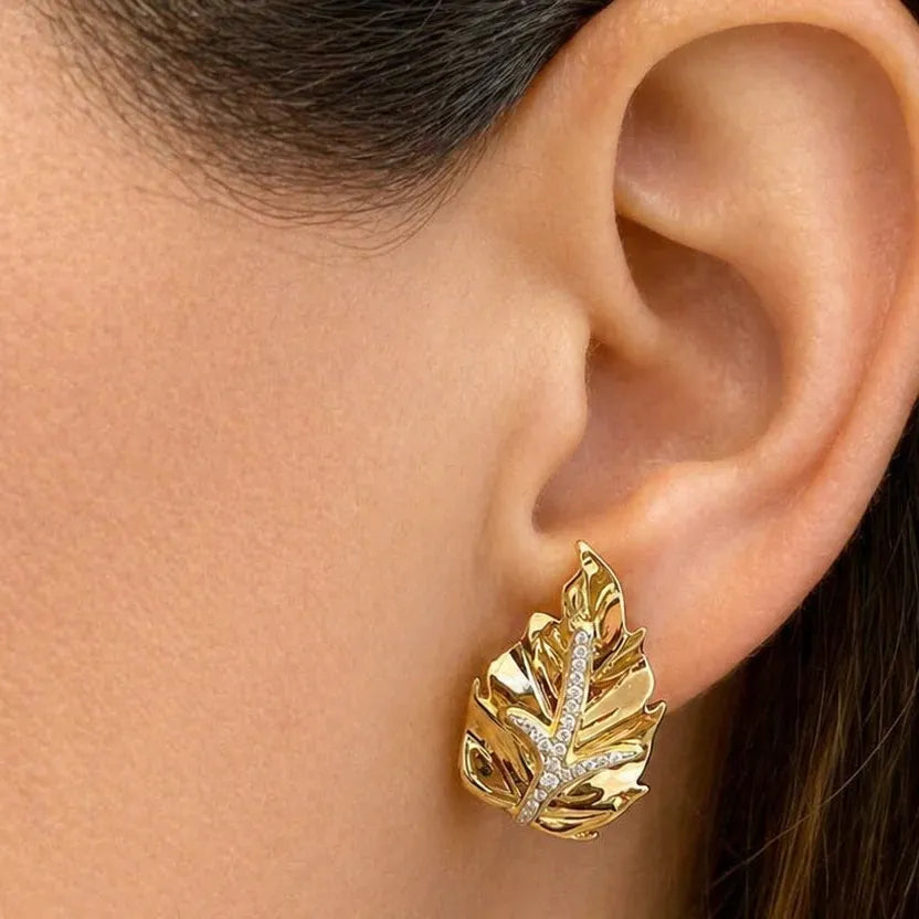 18k yellow gold leaf earrings with diamond accents and omega-style backs
