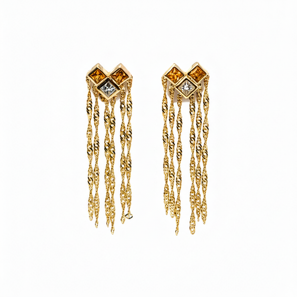 18k yellow gold earrings with yellow sapphires, diamonds, and chain drops