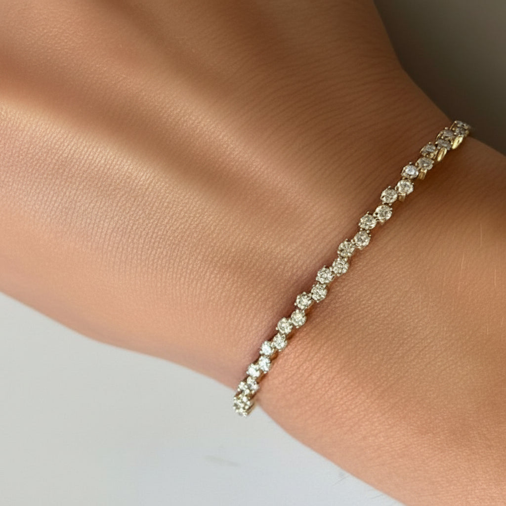 18k yellow gold zig-zag bangle bracelet with round brilliant diamonds by Diamond Tales